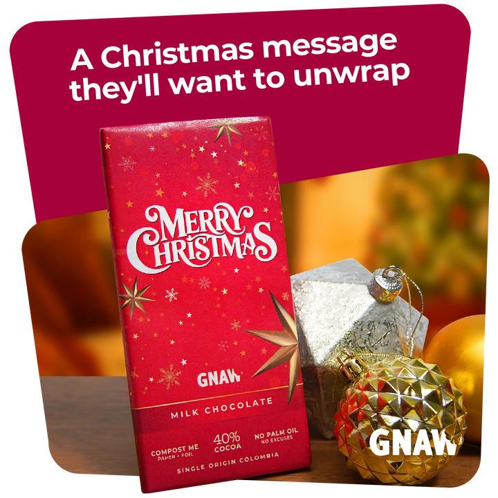 A red GNAW Christmas milk chocolate bar package with white &