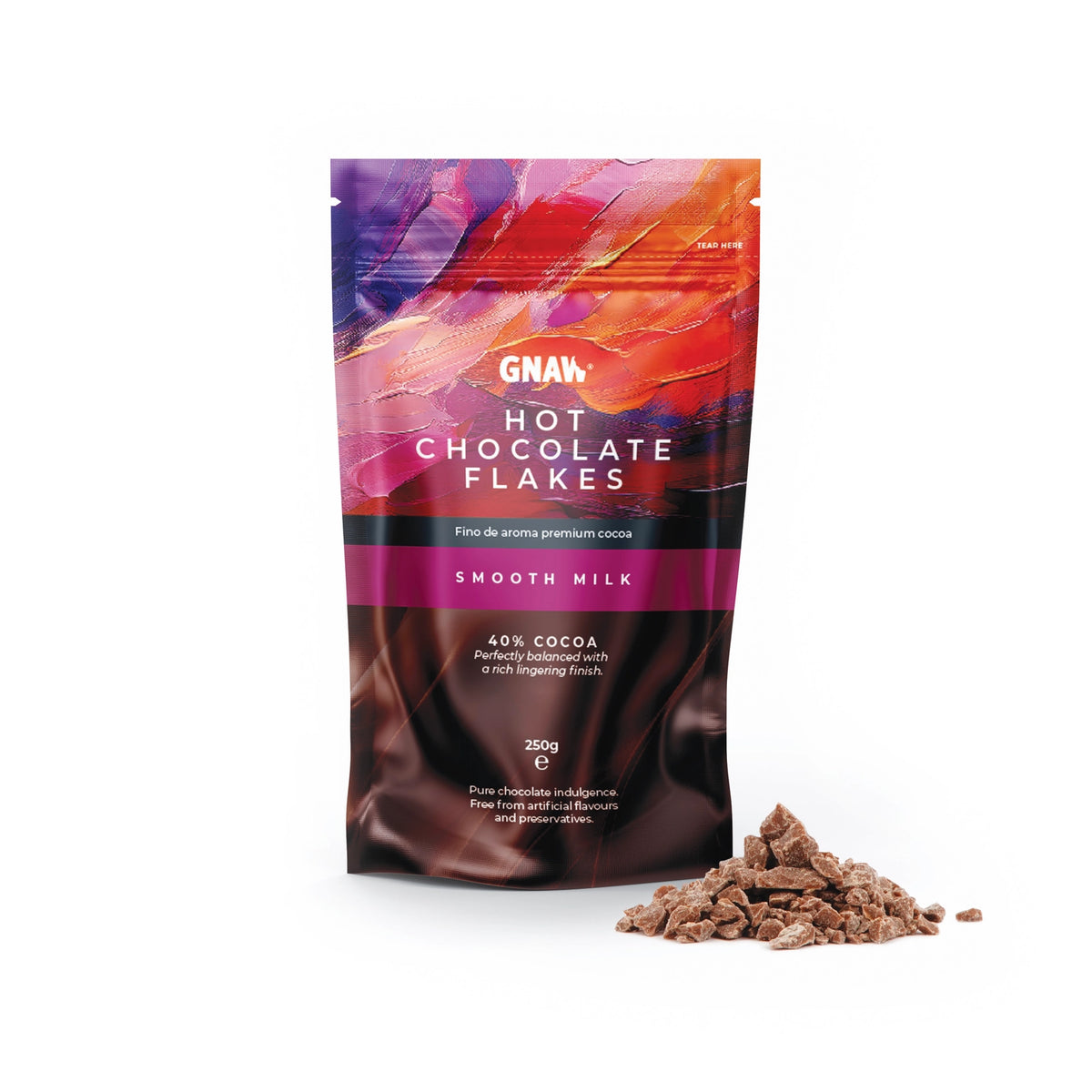 A stand-up pouch of GNAY Hot Chocolate Flakes in Smooth Milk flavor, shown on a white background with a small pile of the chocolate flakes in front.
