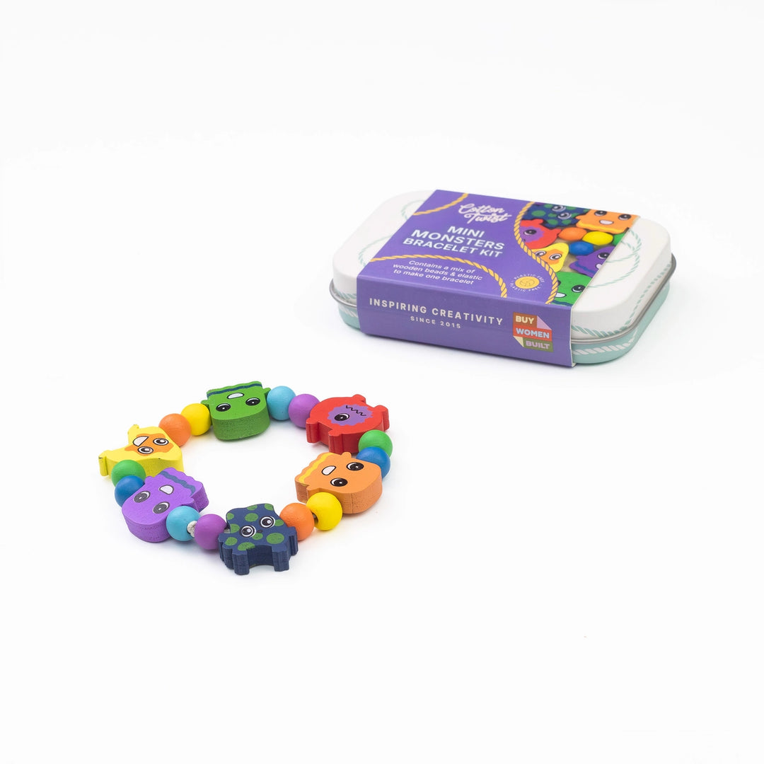 Colorful mini monster bracelet set with packaging on a white background