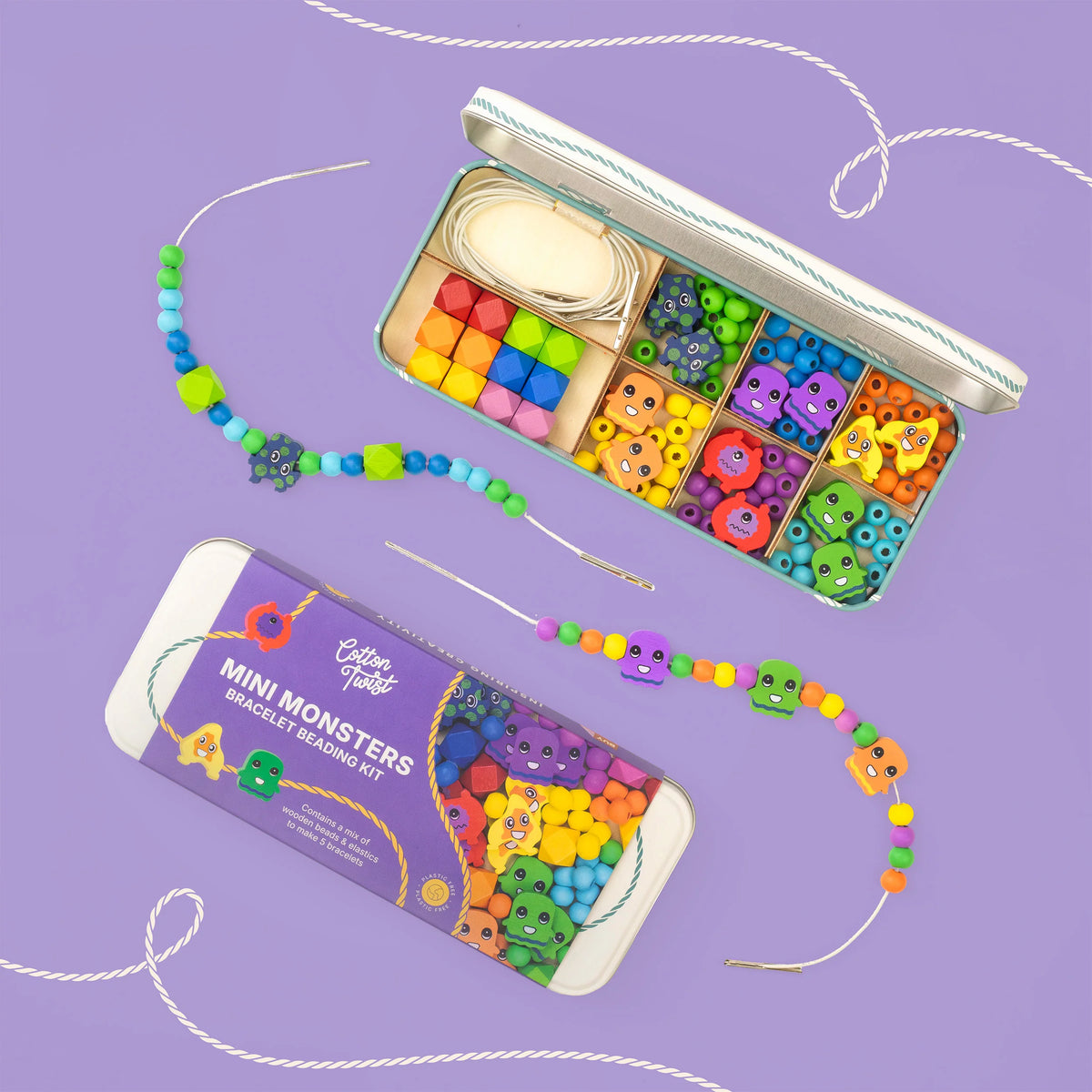 Mini monsters bracelet beading kit with colourful beads and packaging on a purple background