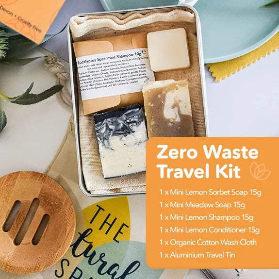 inside the Natural Spa Citrus Mini On the Go Travel Kit with travel sized soap, shampoo, conditioner and face wash