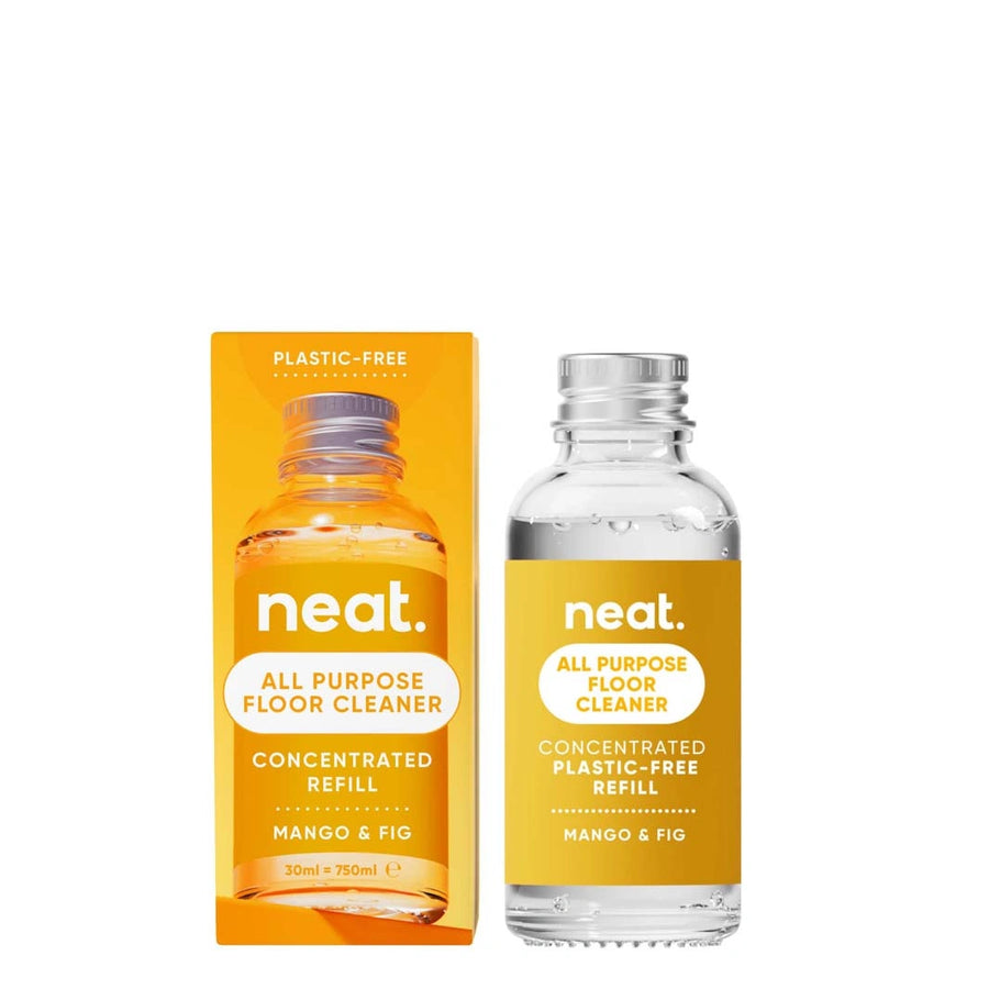 small glass bottle of Neat All Purpose Floor Cleaner Mango + Fig with an orange card box 