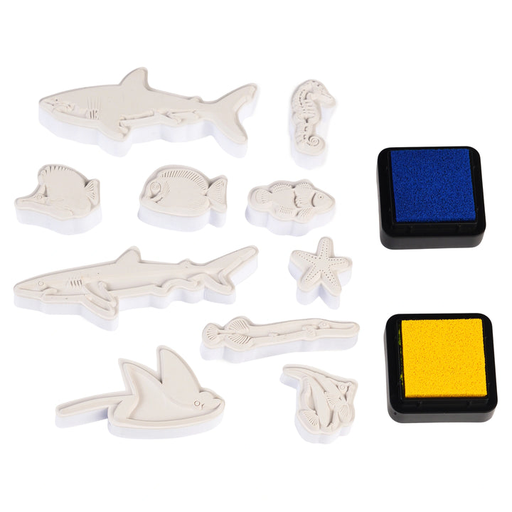 Set of animal-shaped stamps with ink pads on a white background