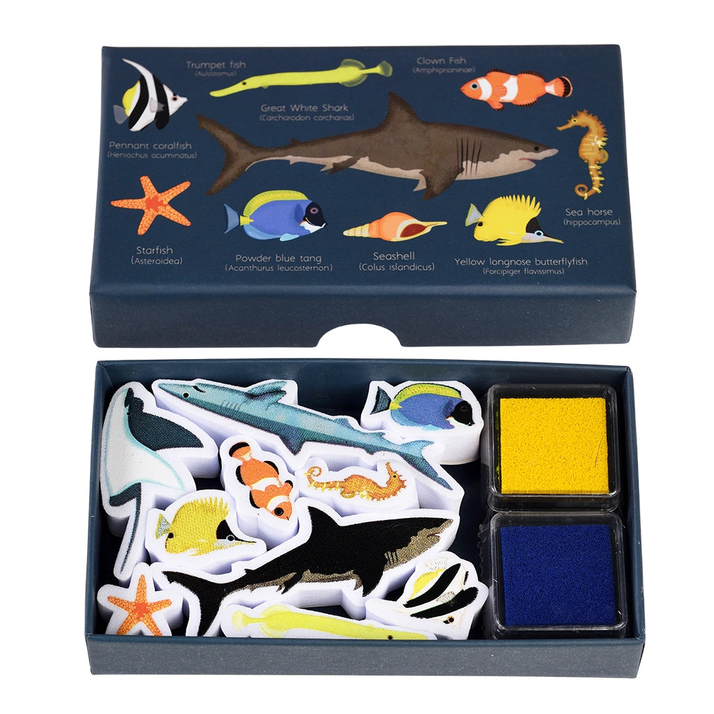 Set of ocean-themed stamps with yellow and blue ink pads in a gift box illustrated with ocean creatures