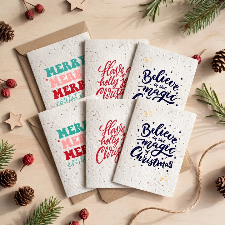 pack of 6 plantable Christmas cards with hand lettered designs and kraft envelopes