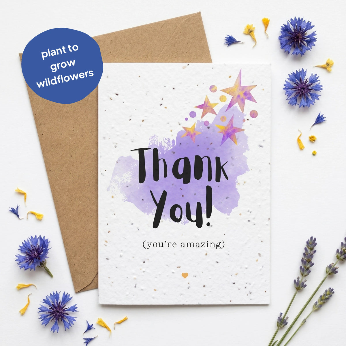 Greeting card with 'Thank You! (You're amazing)' text, surrounded by flowers and a seed paper envelope.