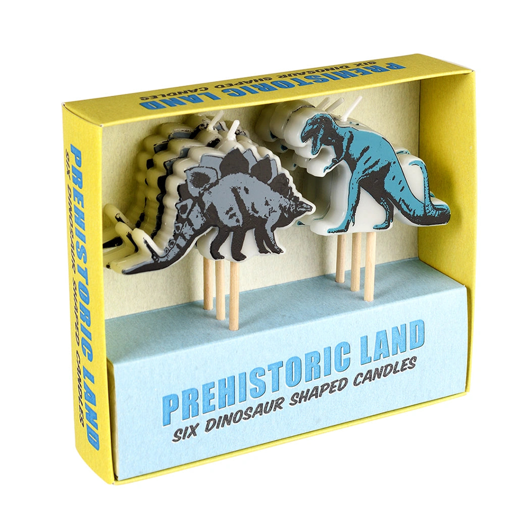 retro style dinosaur party cake candles in a yellow and blue box