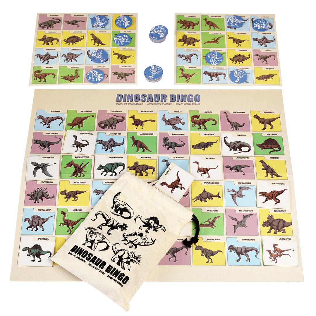 Dinosaur bingo game set with cards, markers, and a stamp on a white background