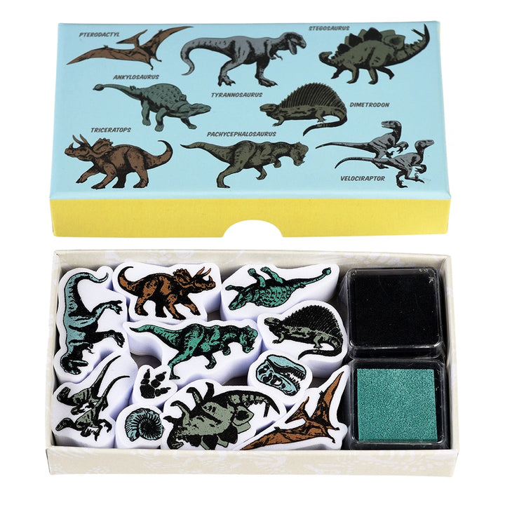 Set of dinosaur-themed stamps in a box with illustrations on the lid.