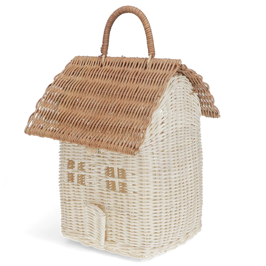A house-shaped woven wicker basket bag with a brown wicker roof and handle, and a cream-coloured body with gold Chinese characters on the front, shown on a white background.