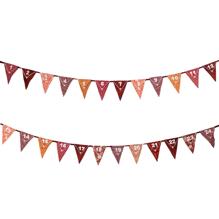 Decorative reusable Christmas advent calendar bunting with red and orange flags on a white background