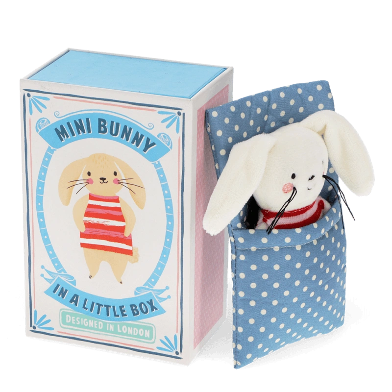 a white Bunny Soft Toy wearing a red stripe jumper with a blue and white polka dot bed. The bunny comes in a sliding gift box and is perfect for kids age 3 and over