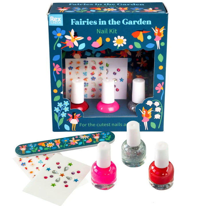 set of three nail polishes with a patterned nail file and nail gems packaged in a fairy themed gift box