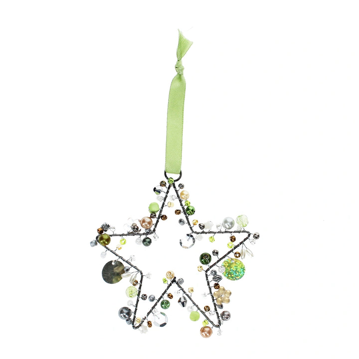 handmade silver star shaped hanging decoration embellished with green beads and hung with a green ribbon.