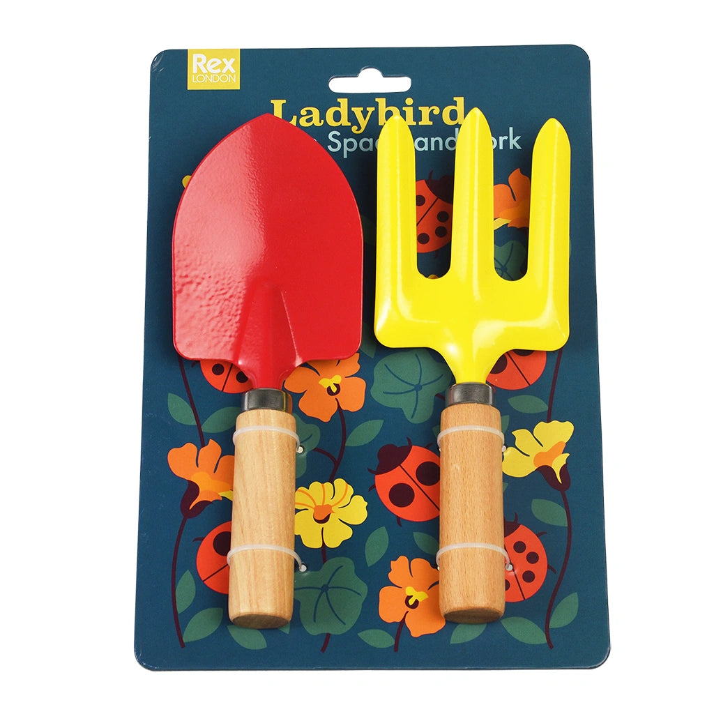 Children's red and yellow Ladybird Gardening Tools on  backing card with ladybirds and plants. For kids age 3+
