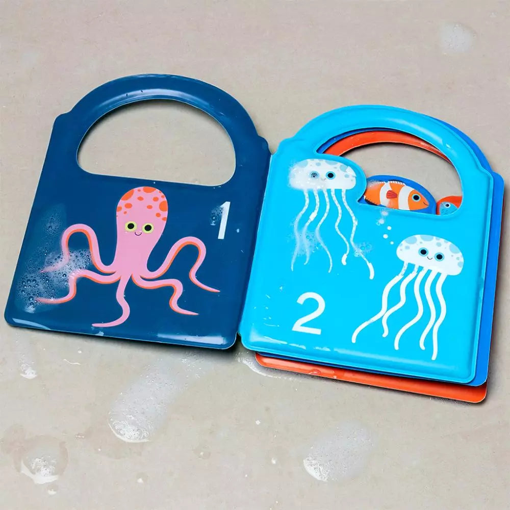 ocean themed, waterproof colour changing bath book. The book is open showing octopus and jellyfish illustrations with the number 1 and 2.  Suitable from birth. 