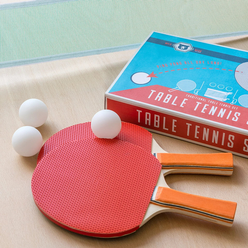 Rex London Wild Bear Table Tennis Set  including bats, balls and a net set up on an indoor table. 