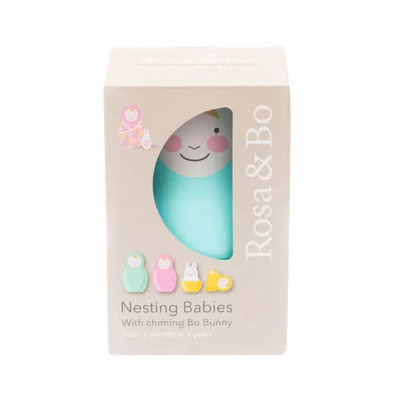 Rosa + Bo Rainbow Nesting Dolls in a beige gift box. For babies aged 12 months and over 