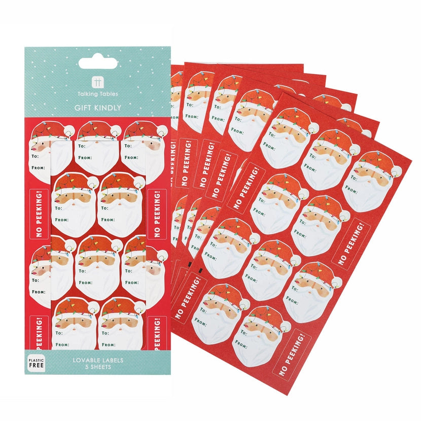 Set of Santa Christmas Gift tag stickers with 'No Peeking' text on red sheets.