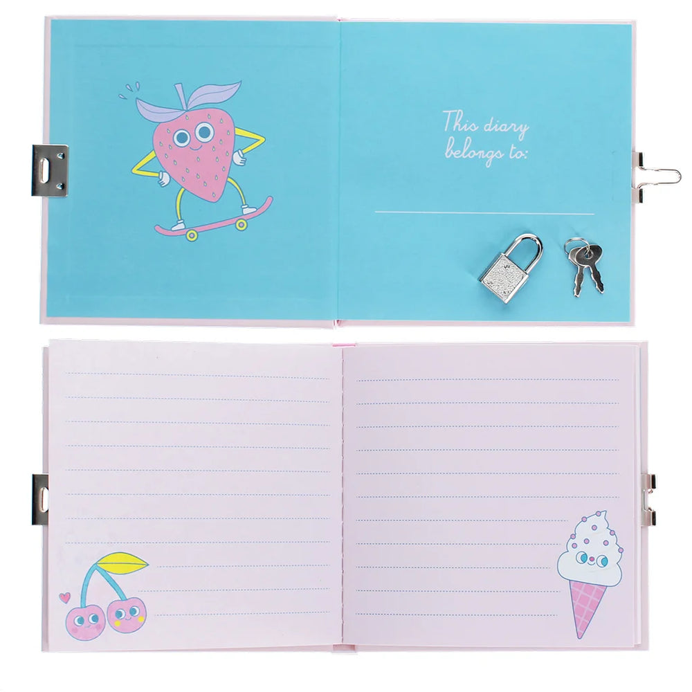 Open notebook with cartoon designs on a blue and pink background