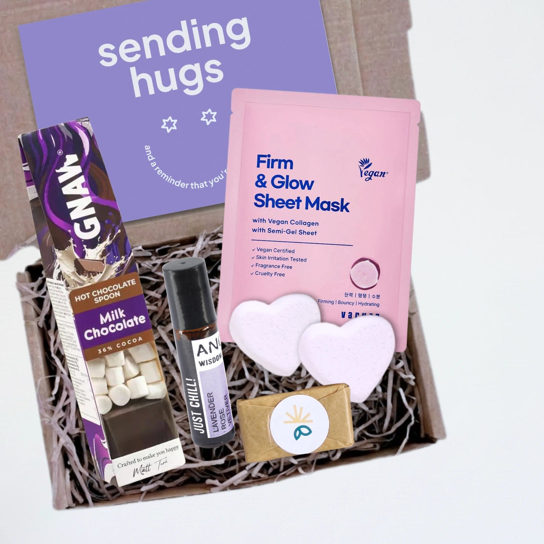 close up of a pampering gift box with a 'sending hugs' gift card
