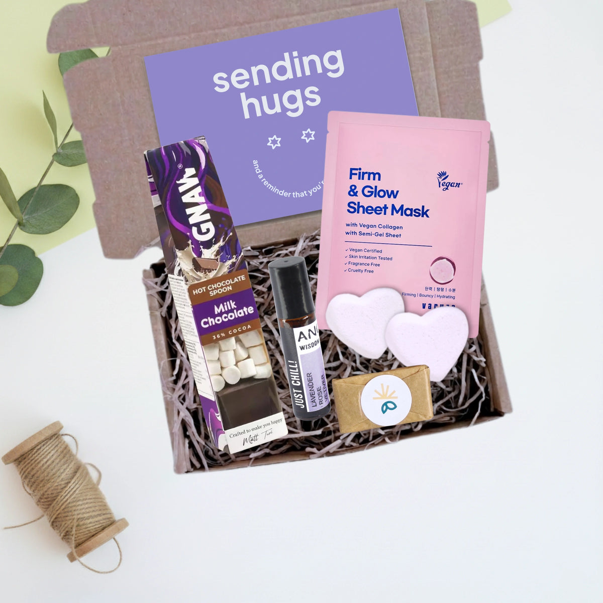 sending hugs gift box with face mask, hot chocolate, bath bombs and pampering products