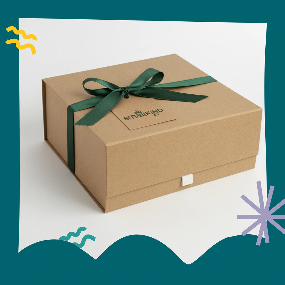 Brown gift box with a green ribbon and 'Smallkind' branding on a white background