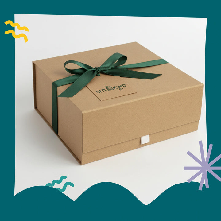 Brown gift box with a green ribbon and 'Smallkind' branding on a white background