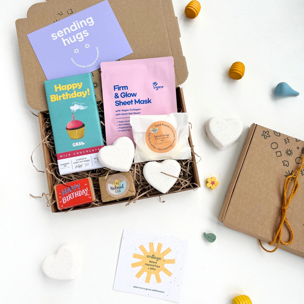 Happy Birthday Letterbox Gift set by Smallkind including mindful pampering products and treats in a hand stamped letterbox gift box with a 'sending hugs' card.