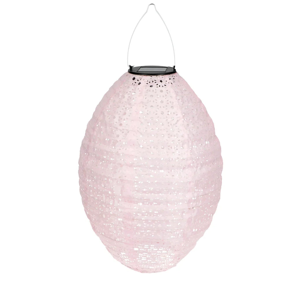 Pink spherical solar lantern on a white background