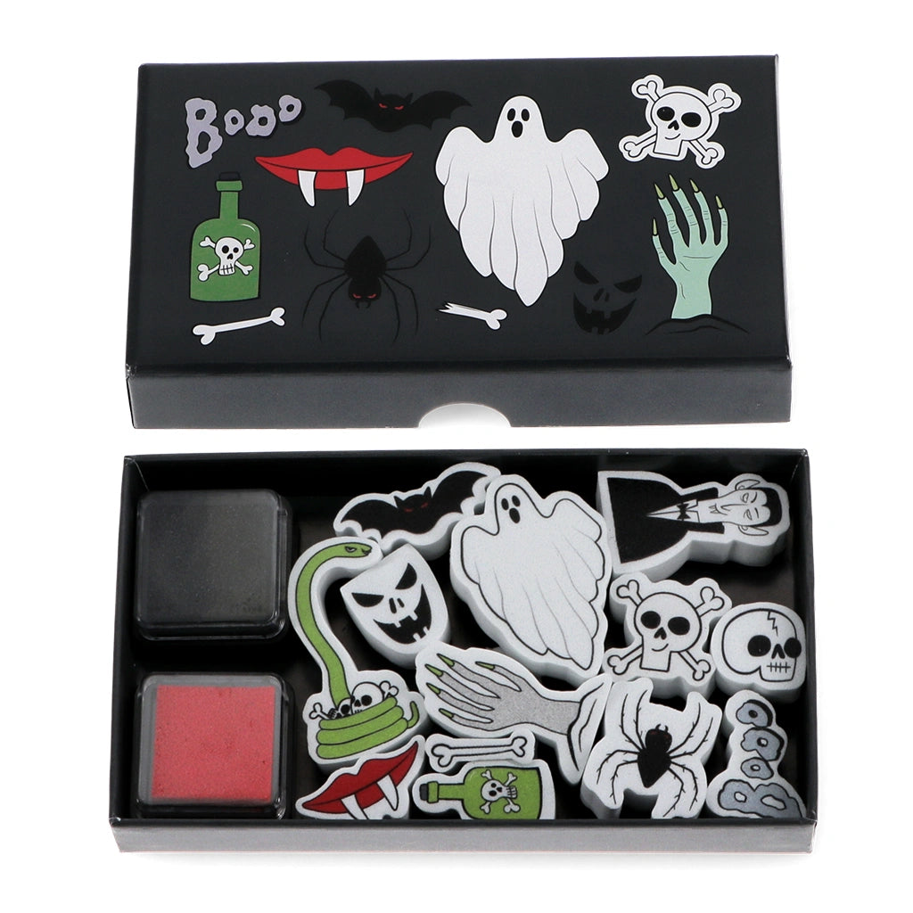 Halloween-themed stamp set with various stamps and ink pad in a box for kids age 3+