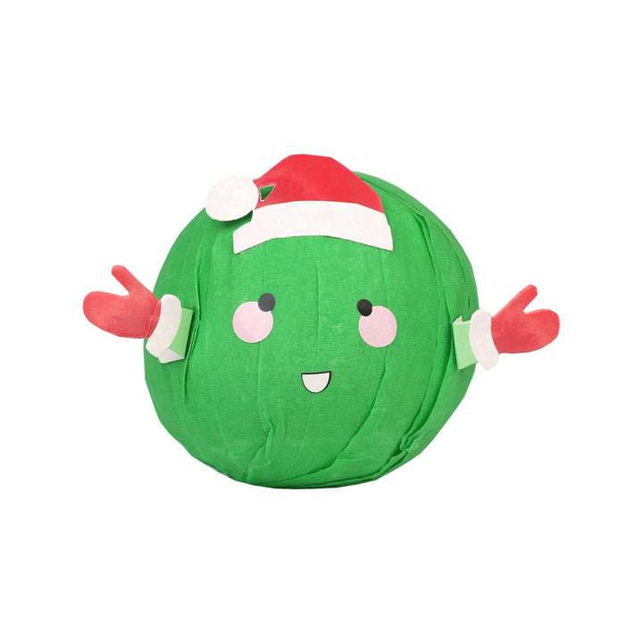 Green sprout pass the parcel game ball with a face, red arms, and a Santa hat on a white background