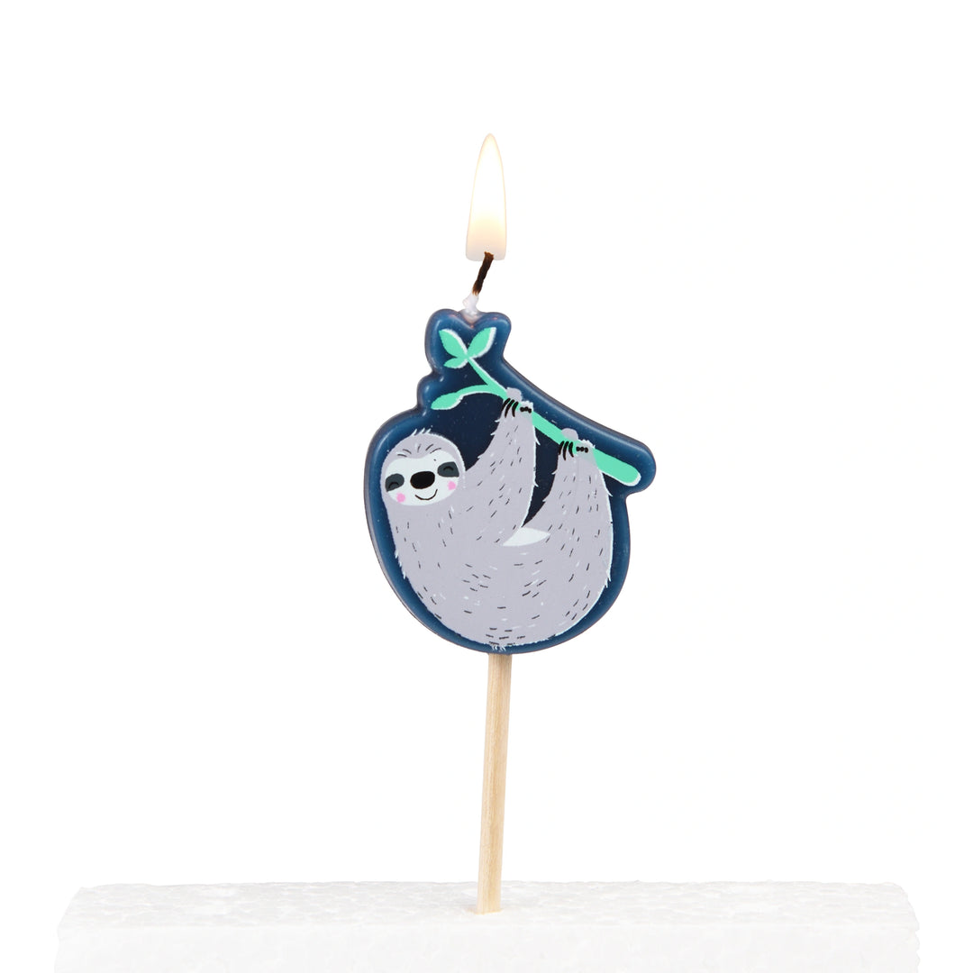 Sloth-themed birthday candle on a white background