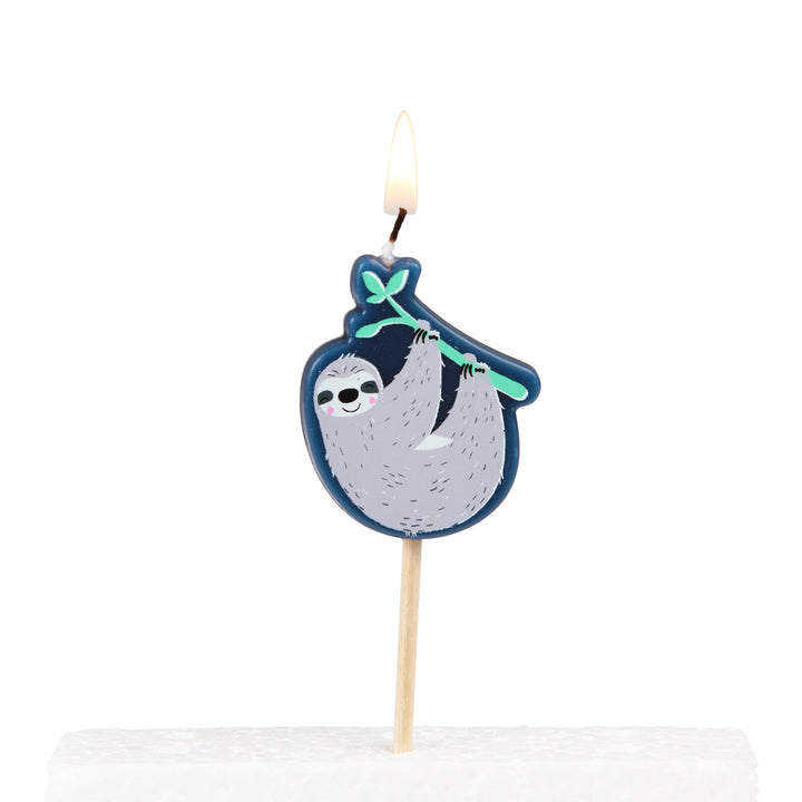 Sloth-themed birthday candle on a white background