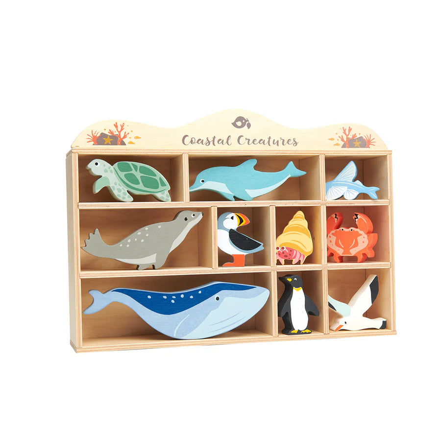 Tender Leaf Coastal Animals Shelf Set including wooden sea creatures in a wooden display shelf, complete with individual compartments for each animal.
