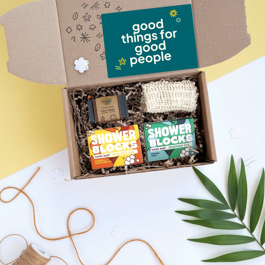 Green Grooming Gift Box for men including 'Shower Blocks' bars, facewash and a soap saver with a 'good things for good people' label on a white background.
