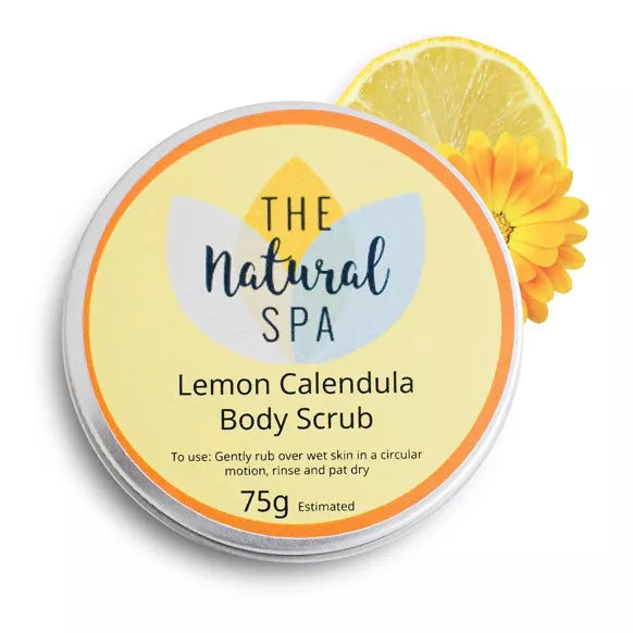 A container of The Natural Spa Lemon Calendula Body Scrub with a lemon and a yellow flower on the label, indicating a moisturising body scrub with lemon and calendula essential oils.