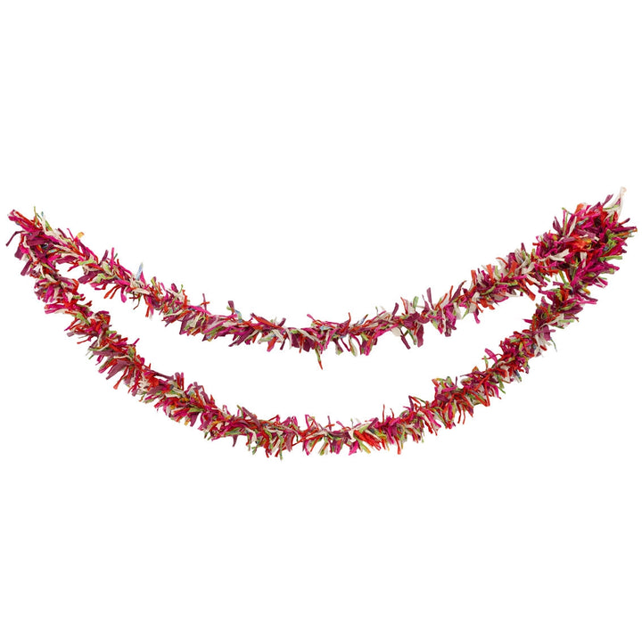 Red tinsel garland on a white background