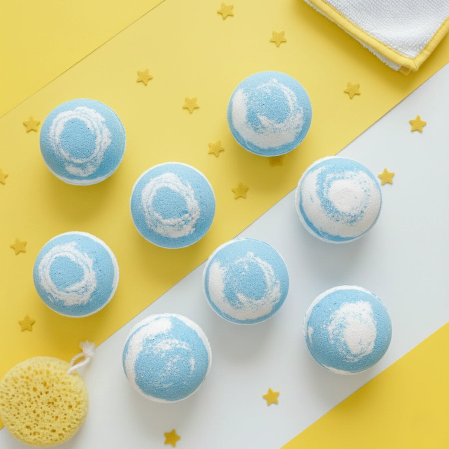 blue and white round bath bombs on a yellow and white background