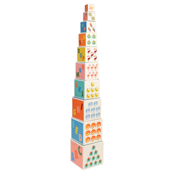 Stack of colorful children's blocks with letters and animal illustrations on a white background