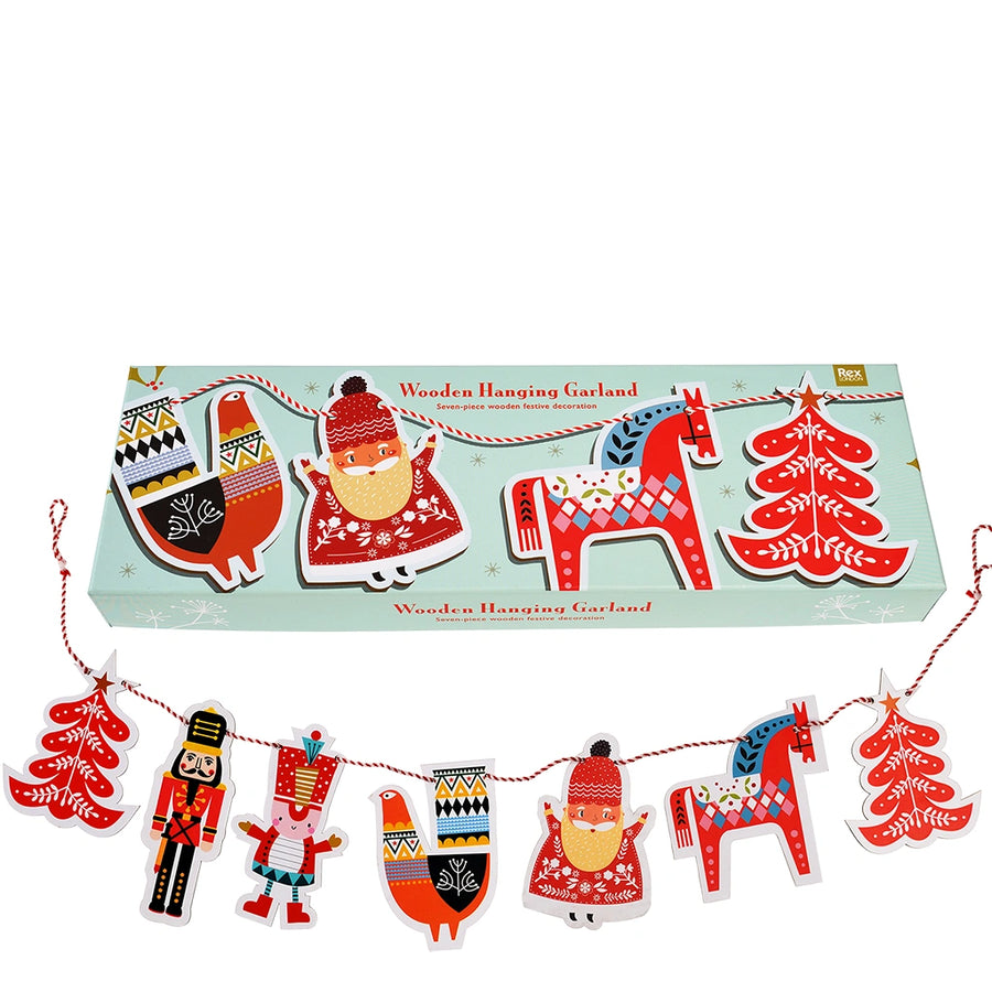 Wooden hanging garland with Scandi inspired festive designs on a white background