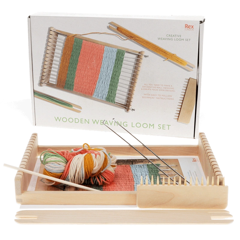 Children's Wooden Weaving Loom by Rex London. The kit includes a wooden loom with accessories and 5 skeins of yarn in neutral colours. For children aged 6 and over. 