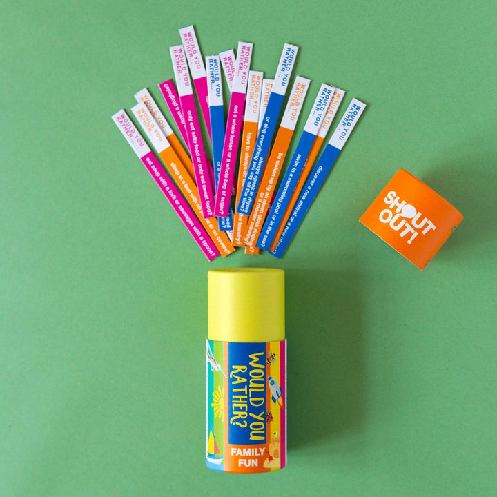 would you rather Shout-out question cards with a colourful gift tube on a green background