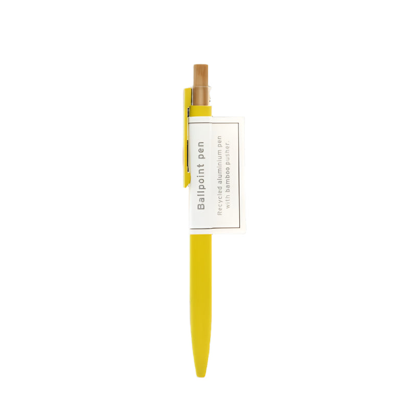 Yellow pen with a white label on a white background