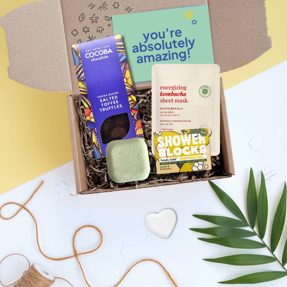 you're amazing gift box with salted toffee truffles, energising face mask, shower steamer and shower gel bar. 
