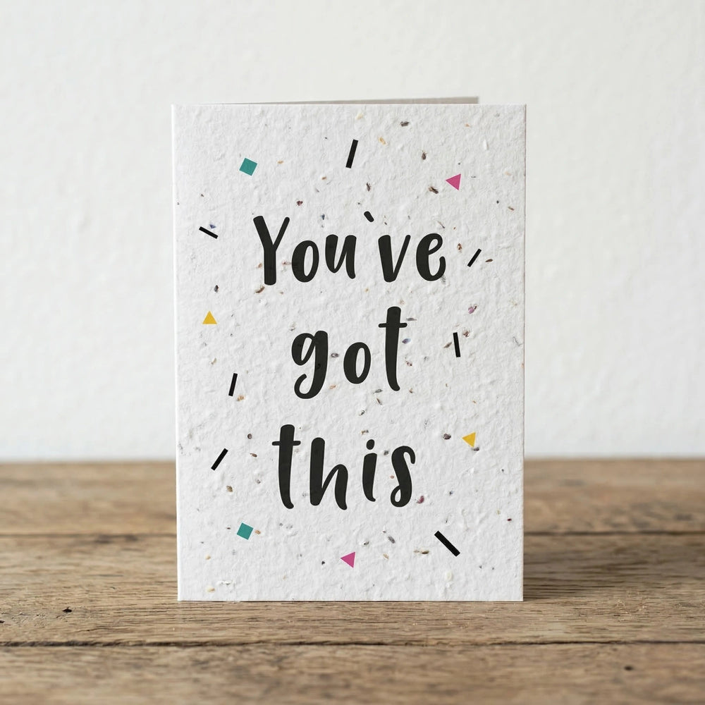 Motivational card with 'You've got this' text on a wooden surface