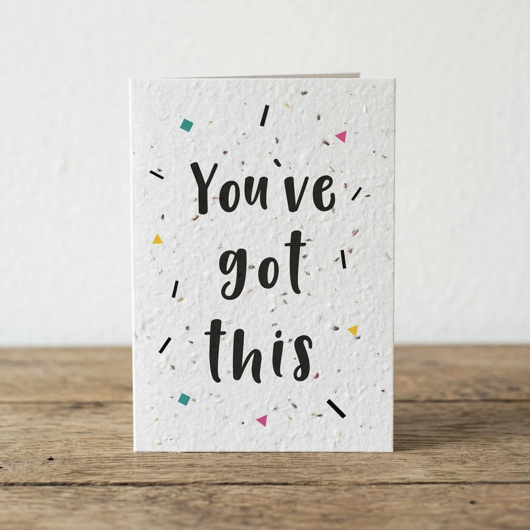 Motivational card with 'You've got this' text on a wooden surface