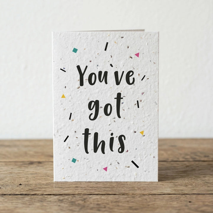 Motivational card with 'You've got this' text on a wooden surface