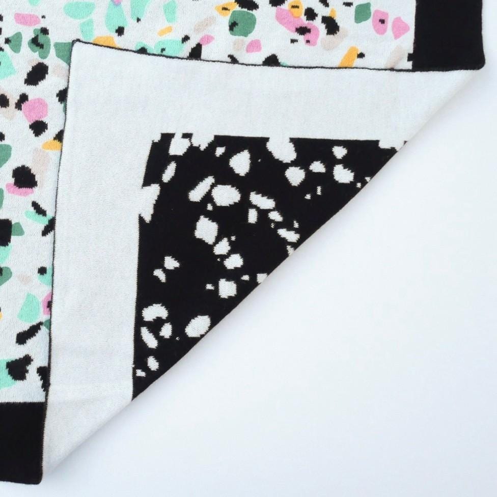 etta loves terrazzo knitted baby blanket