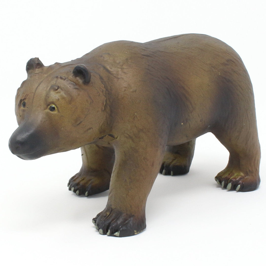 green rubber toys brown grizzly bear